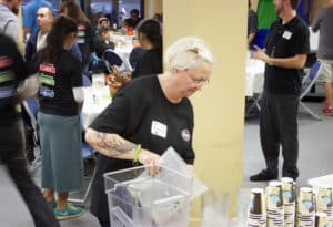 Melissa Adams, Marketing Coordinator for Harry's Fresh Foods, serves at our annual "Serving Hope" event.