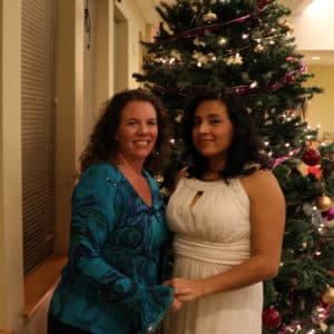 Christine (left) and Raquel enjoy some Christmas festivities at Shepherd's Door.
