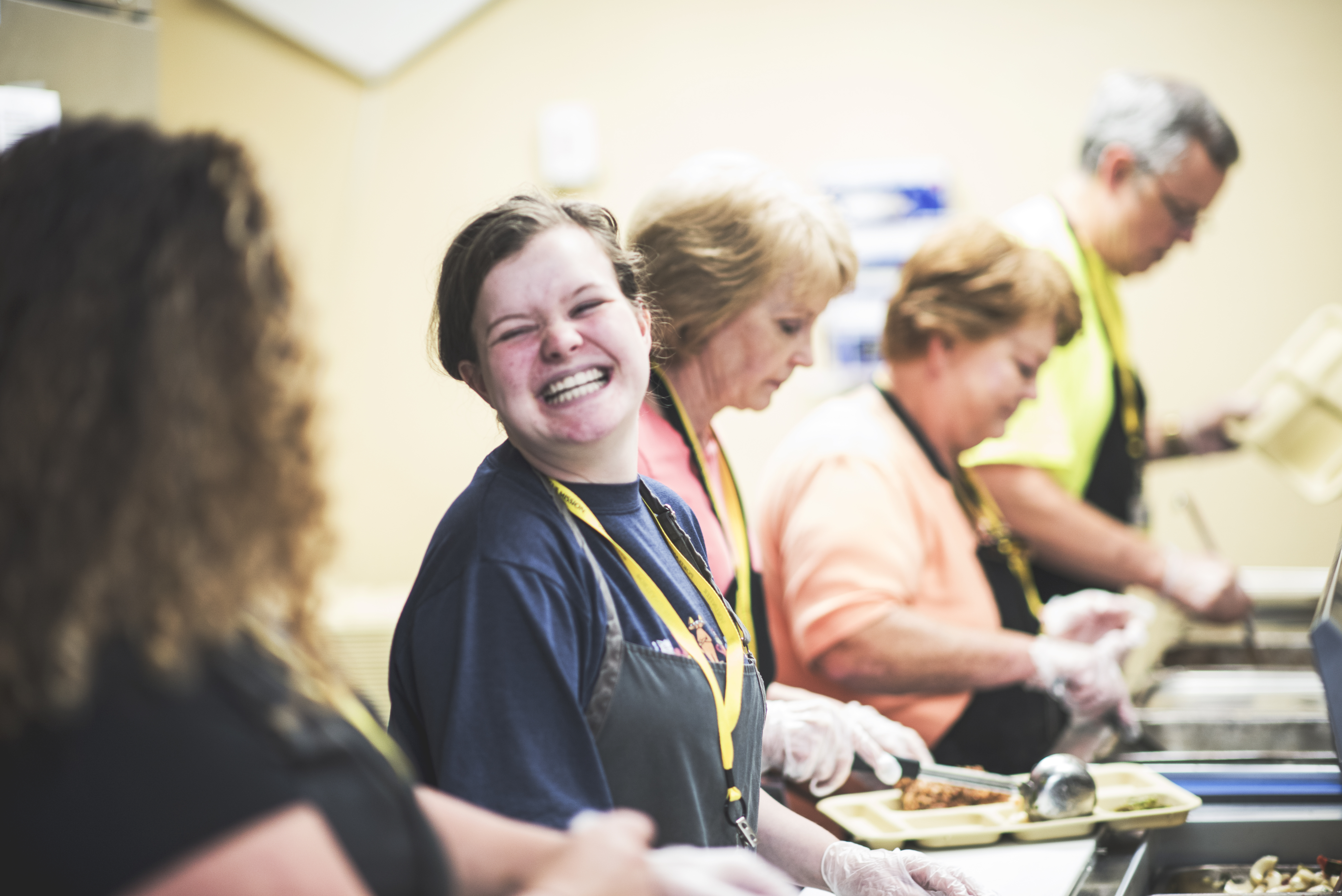 Happy Volunteer at Portland Rescue Mission Homeless Shelter